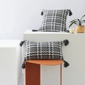 Modern black and white geometric woven pillows with tassels in square and lumbar shapes - Dark Gray