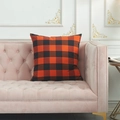 Orange and black buffalo check decorative throw pillow on a velvet sofa for Halloween decor - Large Square Pillowcase