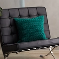 Square teal velvet decorative pillow with handcrafted vertical pleated texture on a chair - Dark Green