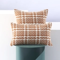 Two orange and white woven lumbar pillow covers with modern geometric patterns - Tobacco Brown