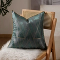 Luxury dark teal velvet pillow with gold geometric triangles and elegant piped edges - Geometric Fantasy
