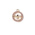 Colgante redondo dorado con halo de circonitas rosas y diseño de ave volando - Patrón de Águila Tono Dorado con Zirconia Blanca