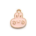 Pink enamel cartoon bunny rabbit charm with gold alloy edges and a small metal hanging ring - Pink