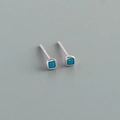 Detail view of square S925 silver stud earrings with turquoise blue cubic zirconia stones - Style F (Silver)