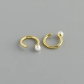Close-up of minimalist gold plated sterling silver ear cuffs with round white pearls - Artificial Pearl Style (Style 1) / Gold