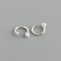 Detail of S925 silver ear cuffs with white pearls on a minimalist grey background - Artificial Pearl Style (Style 1) / White Gold
