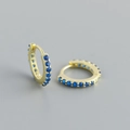 Boucles d'oreilles créoles en argent 925 dorées avec zircons bleus incrustés - Pierre Bleue (Or)