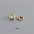 Detailed macro view of 7mm golden S925 sterling silver beaded hoop earrings with a shiny finish - Inner 7mm / Gold