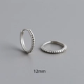Macro shot of 12mm S925 sterling silver hoop earrings with beaded milgrain texture - Inner Diameter 12mm / White Gold