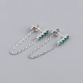 Close-up of S925 sterling silver earrings with green zircon stones and hanging chain link - 925 Silver / Emerald Green (Silver)
