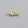 Detailed view of gold S925 silver stud earrings with clear round cubic zirconia and beaded edge - 925 Silver / Clear White (Gold)