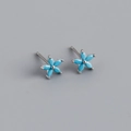 Macro shot of S925 sterling silver flower earrings with marquise-cut sky blue stones - 925 Silver / Turquoise Blue (Silver)