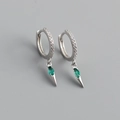 Macro shot of S925 silver hoop earrings with zircon pavé and green marquise stone drop - 925 Silver / Green Zirconia (White Gold Color)