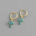 Close-up of gold S925 silver hoop earrings with a turquoise inlaid cross pendant - 925 Silver / Blue Zirconia Gold
