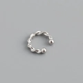 Detail of s925 silver ear cuff with spiral twisted design and polished ball ends - 925 Silver / White Gold