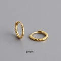 Detailed view of 8mm twisted rope gold hoop earrings with S925 sterling silver stamp - Number 8 / Gold