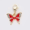 Pendentif papillon doré en émail rouge avec strass blancs et fermoir mousqueton - Style Papillon en Strass
