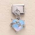 Italian modular charm featuring a light blue translucent heart pendant with shooting star detail - Iridescent Light Blue Starburst Heart Style (3)