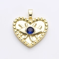 Gold heart pendant featuring a blue evil eye design with radiant sunburst texture - Blue Heart Evil Eye Style (2)