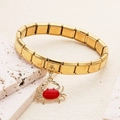 Bracelet modulaire italien en acier inoxydable doré avec un pendentif crabe rouge - Crabe Rouge (1)