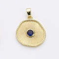 French vintage sunburst gold pendant with a round blue gemstone inlay and textured edge - Blue Gemstone Sun Ray Texture (7)
