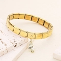 Gold stainless steel modular bracelet featuring a detailed seahorse charm with a pearl - Seahorse Artificial Pearl (6)