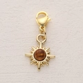 Close-up of a golden sun pendant with brown gemstone and lobster clasp for DIY jewelry - Gold Sun Brown Stone (6)