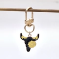 Western style cow head keychain in black and yellow enamel on golden alloy base - Bull Head Flower Style (1)