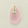 Golden alloy fishtail pendant with teal stones on a soft pink pebble background - Fish Tail Style (1)