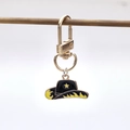 Western cowboy hat keychain in black enamel with yellow star and flame pattern - Black and Yellow Star Cowboy Hat (3)