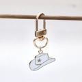 Western cowboy hat keychain with white enamel finish and golden star for bags - White and Gold Star Cowboy Hat (4)
