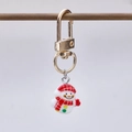 Porte-clés bonhomme de neige de Noël avec finition émail coloré et anneau doré - Bonhomme de Neige Avec Chapeau Rouge Et Blanc Style (15)