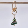 Christmas tree keychain with green enamel pendant and gold metal hook on a display rod - Christmas Tree With Star Top Style (4)