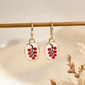 Vintage golden oval drop earrings with delicate red berry pattern on white enamel finish - Red Berry Style (1)