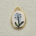 Vintage gold oval pendant featuring light blue floral enamel for DIY jewelry making - Light Blue Flower Style (4)
