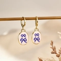Vintage gold oval earrings with light pink enamel and blue ribbon patterns - Blue Bow Style (7)