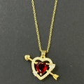 Golden heart necklace with red gemstone and cupid arrow pendant on a dark background - Gold Cupid's Arrow Heart Style (3)