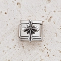 Close-up of a silver stainless steel Italian charm with a 3D embossed cross design - Relief Silver Cross Style (14)