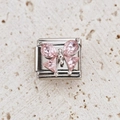 Macro detail of a silver charm with a pink faceted gemstone bow for modular bracelets - Pink Gem Bow Style (26)