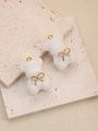 Ciondoli a forma di orsetto in resina bianca traslucida con fiocco dorato e glitter - Bianco