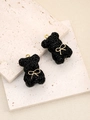 Set di due ciondoli a forma di orsetto con strass neri e fiocco dorato per gioielli - Nero