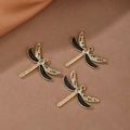Detail of 18K gold dragonfly charms with black enamel and colorful cubic zirconia - Black