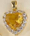 Golden heart pendant with a large yellow center stone and brilliant pavé halo setting - Wheat
