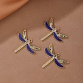 Tre ciondoli a libellula placcati in oro 18K con smalto blu e zirconi colorati - Blu scuro