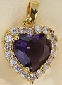 Elegant gold necklace featuring a deep purple heart gemstone with micro-set zircon border - Deep purple