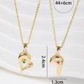 Magnetic gold heart necklaces for couples with green and red gemstone inlay detail - Gold