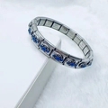 Vintage-Armband aus Edelstahl mit blauen ovalen Edelsteinen und floralen Gravuren - Ovaler Blauer Stein Stil (2)