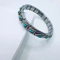 Bracelet extensible vintage en acier inox avec maillons pierre verte et bordure dorée - Style Turquoise Triangulaire (10)