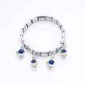 Italian charm bracelet in stainless steel featuring four blue astronaut star pendants - Astronaut