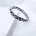 Vintage stainless steel stretch bracelet featuring blue enamel flowers and silver finish - Blue 5-Petal Flower (38)